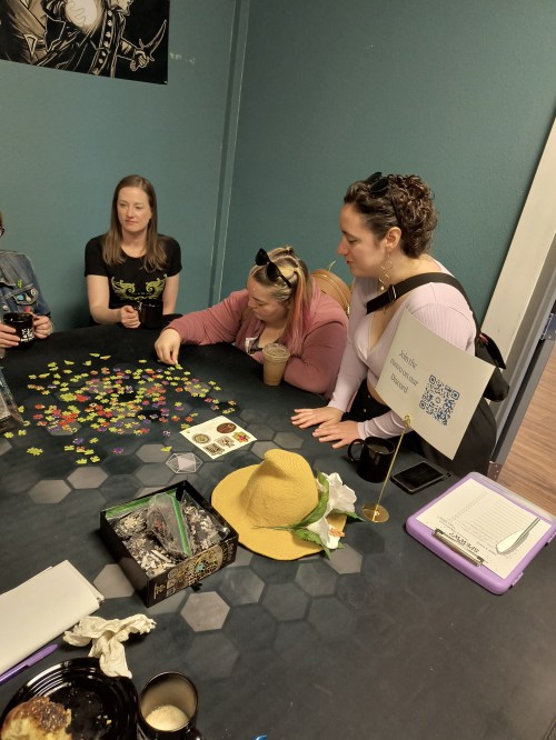 people doing a Harry Potter puzzle